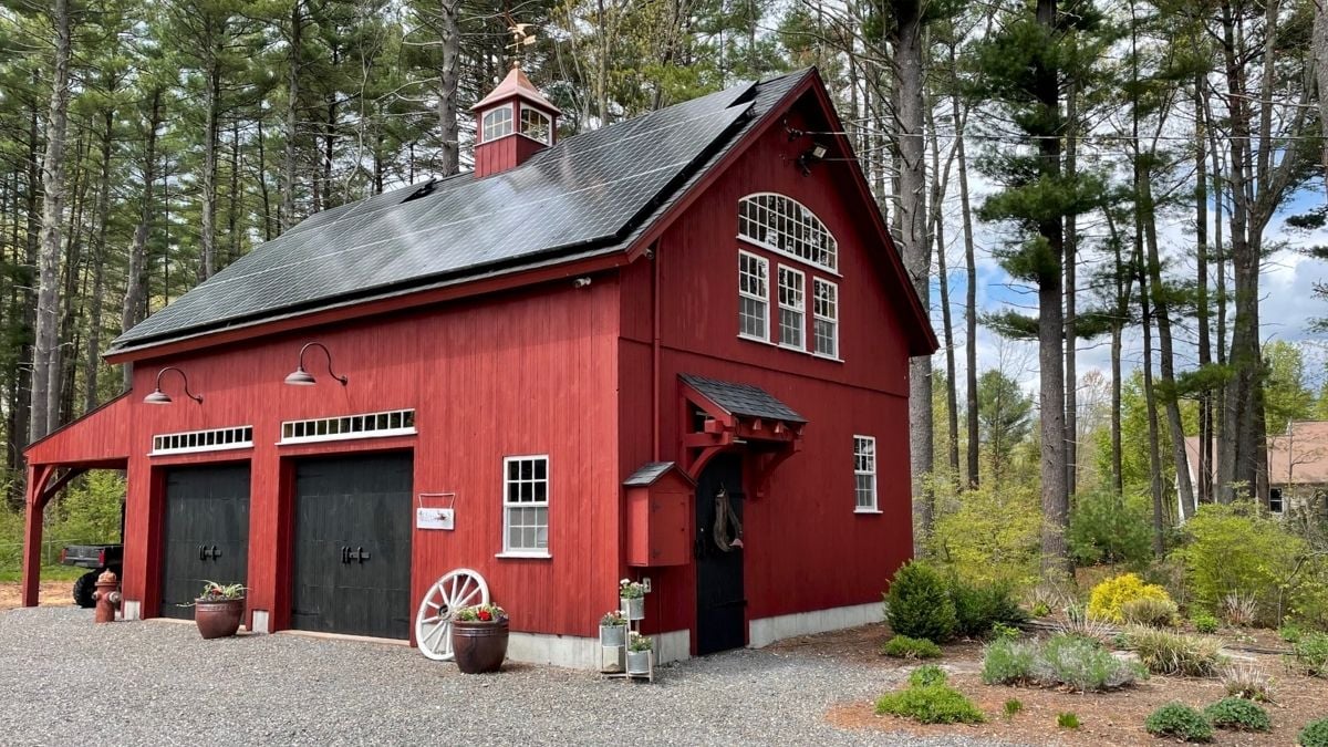 solar panels on a red barn in New Hampshire installed by Granite State Solar